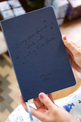 Living Your Dreams personalised notebook in navy with the name Ethan.