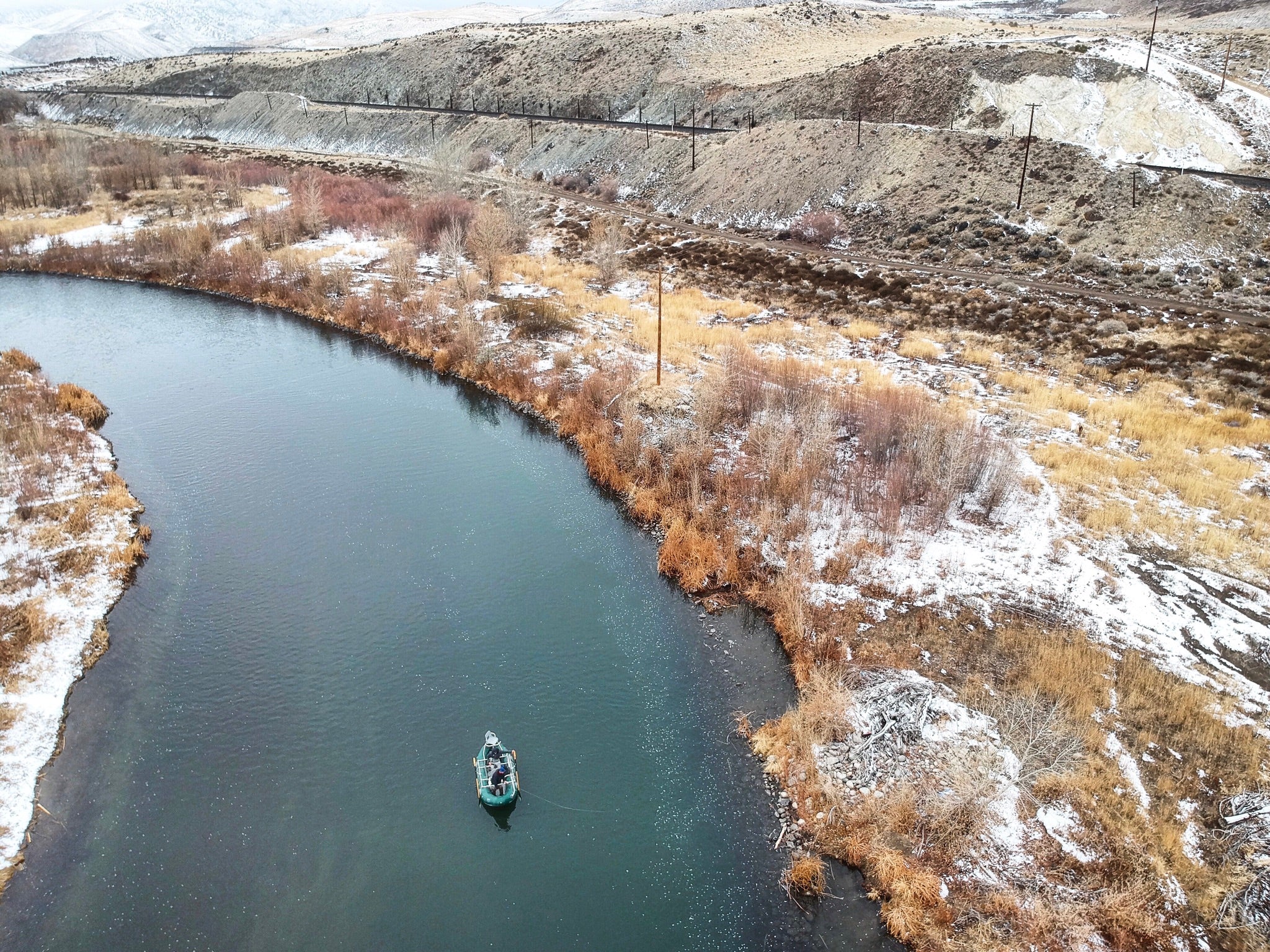 Aerial view of a boat anchored on a river