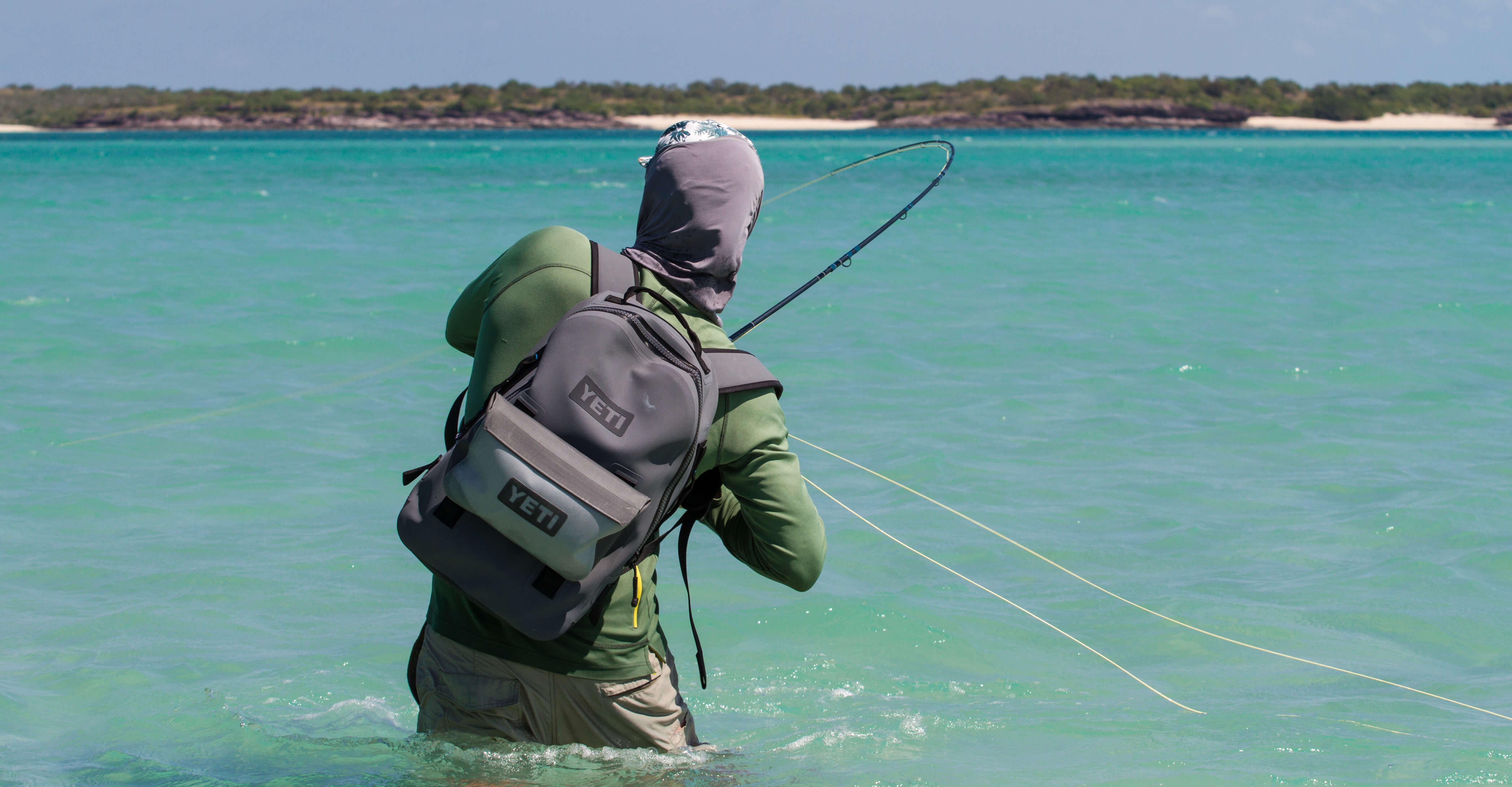 An individual standing in saltwater fly fishing