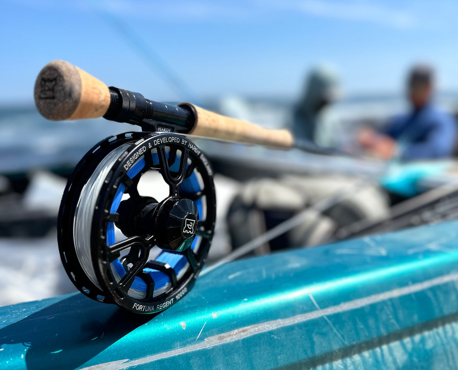 Closeup shot of a fly reel and rod