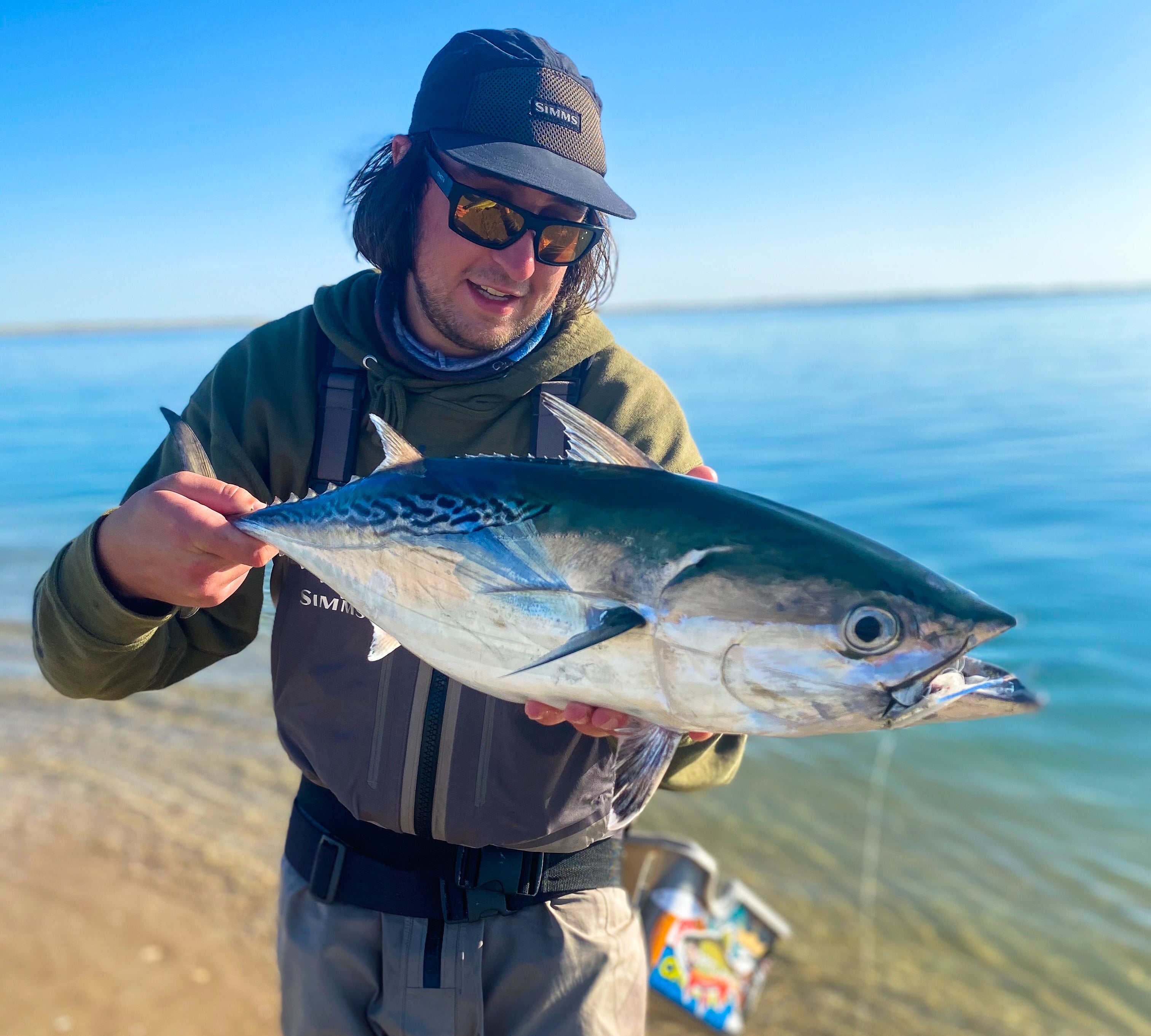 Angler holding up a fish