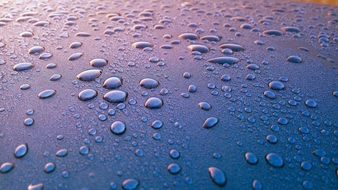 water droplets on metal