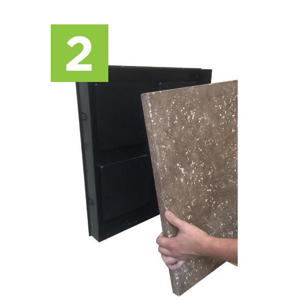 Step Two to install your moss wall art kit -  Insert panel into wall frame.