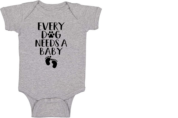 "EVERY DOG NEEDS A BABY" ONESIE