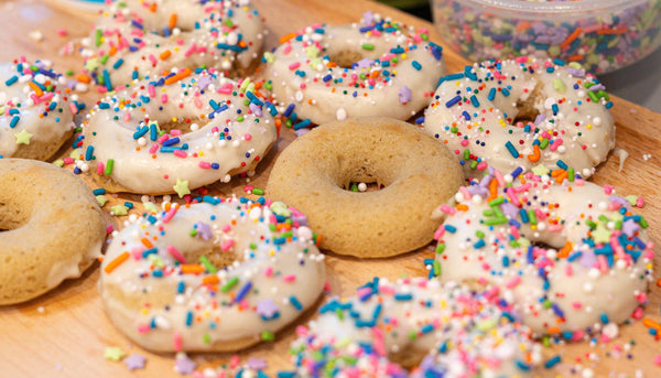 Propello Life gluten free protein donuts with vanilla icing and sprinkles