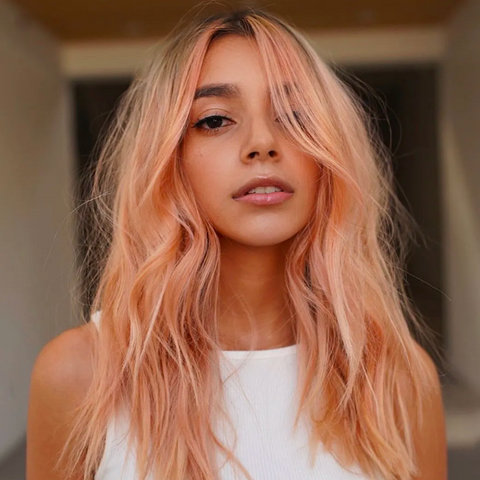 Peach Fuzz Perfection: Embracing Orange Hair Color Trends for 2024 - HairMNL Tousled Online Magazine