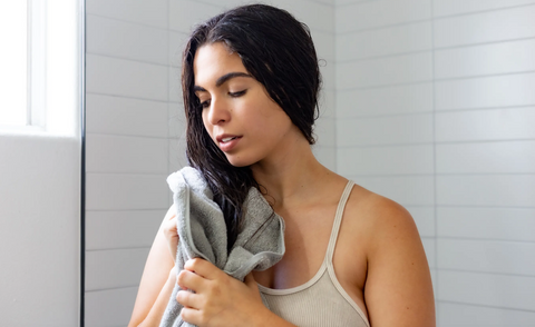 Usng towel in wet hair