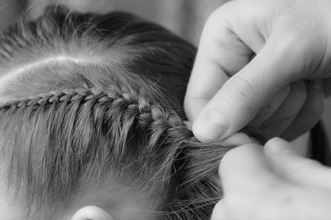 Braid one section of your hair until the end