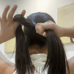 Tie your hair into a low ponytail