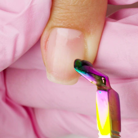 Push back the nail cuticles