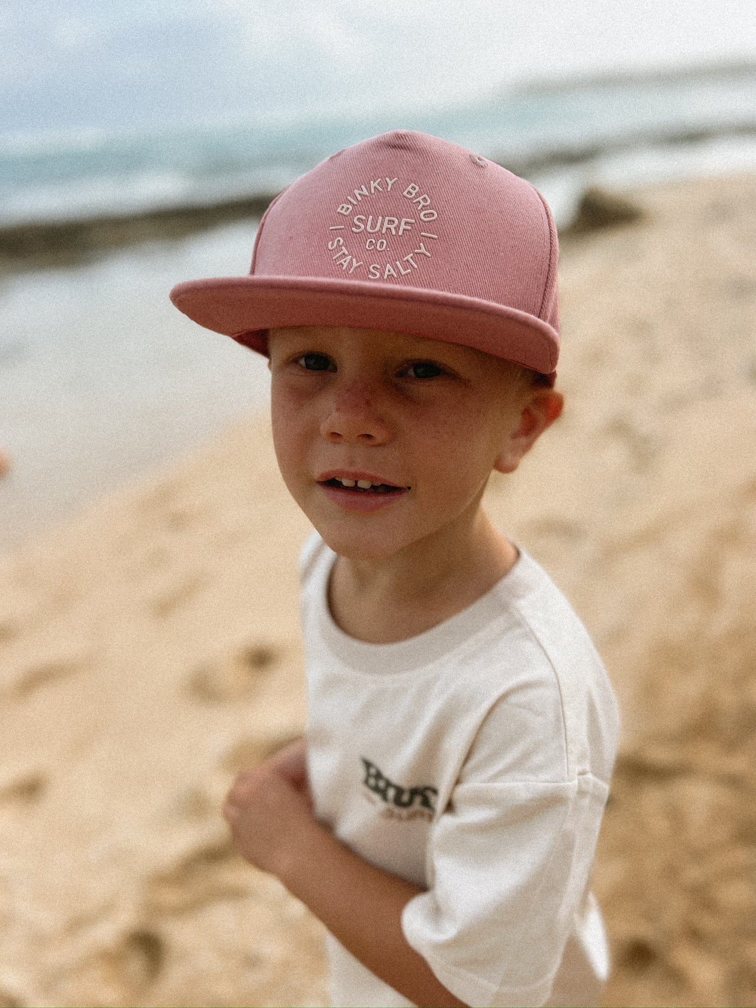 Binky Bro snapback on the beach