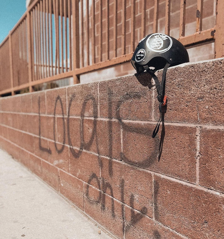 helmet on ledge with binkybro sticker