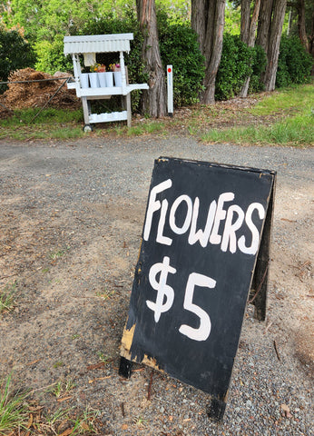 Flower for sale $5 a bunch road side stall