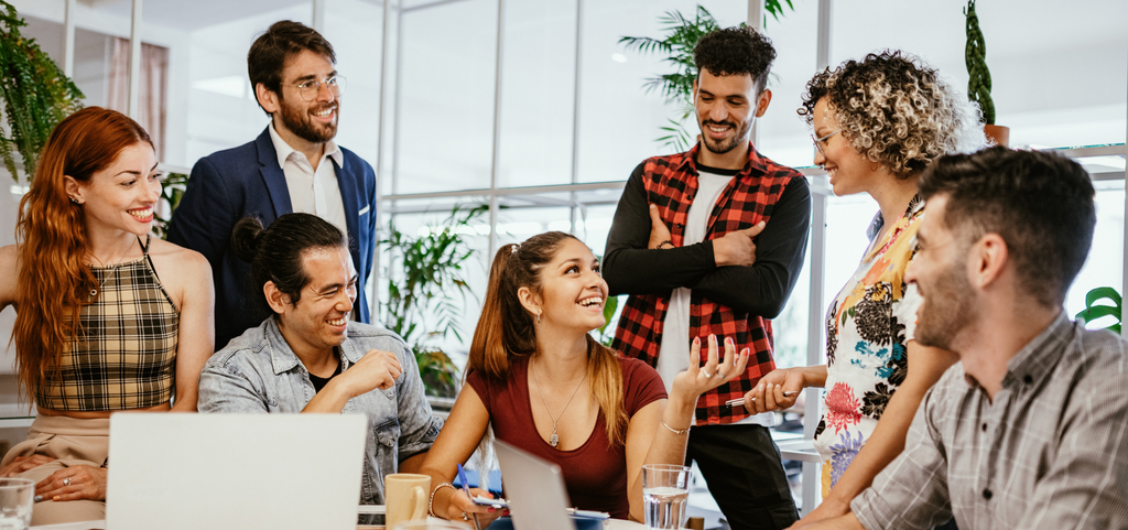 Image of happy workers in an office