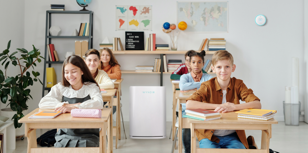 Image of happy students in class with clean air from the WYND Max Air Purifier and Halo