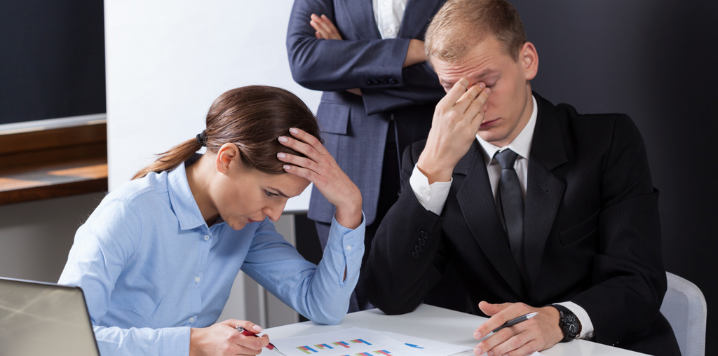 Image of tired employees due to low indoor air quality in the office