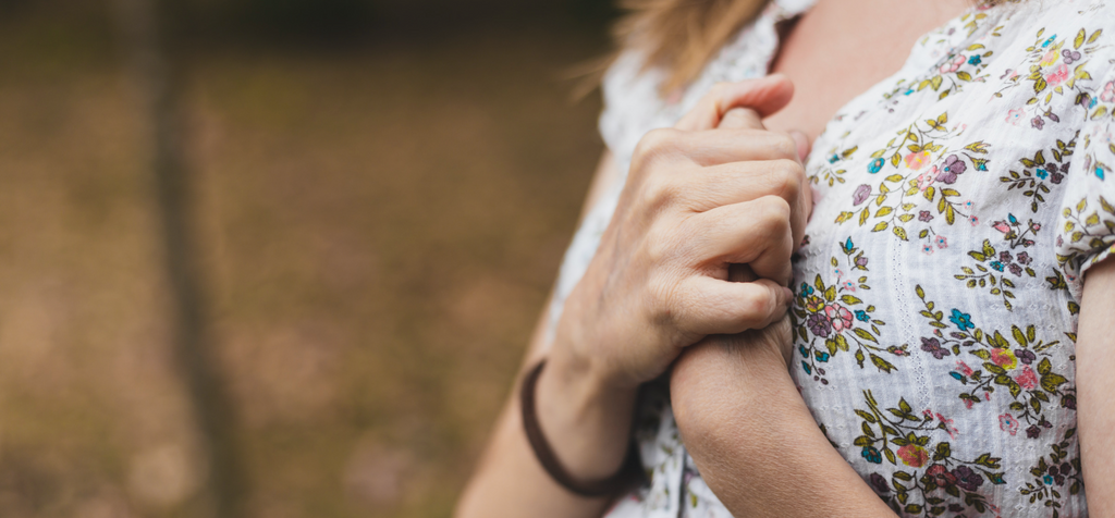 Woman Experiencing Chest Pain Image