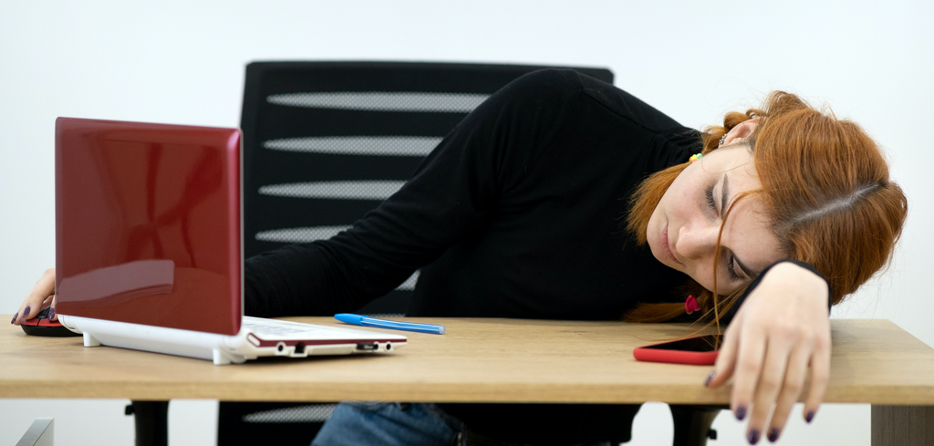 Lazy / Tired worker at desk