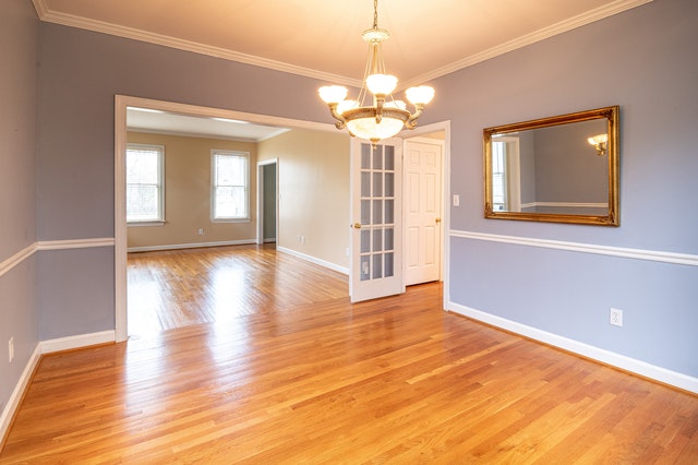 An empty house with great hardwood floors that need protection during a move.