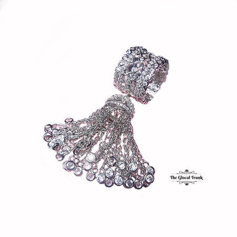https://www.theglocaltrunk.com/products/temptress-crystal-tassel-ring