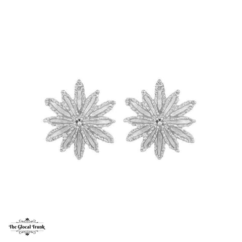 https://www.theglocaltrunk.com/products/silver-sun-stud-earrings