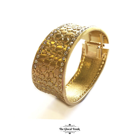 https://www.theglocaltrunk.com/products/bling-in-summer-textured-gold-stone-cuff