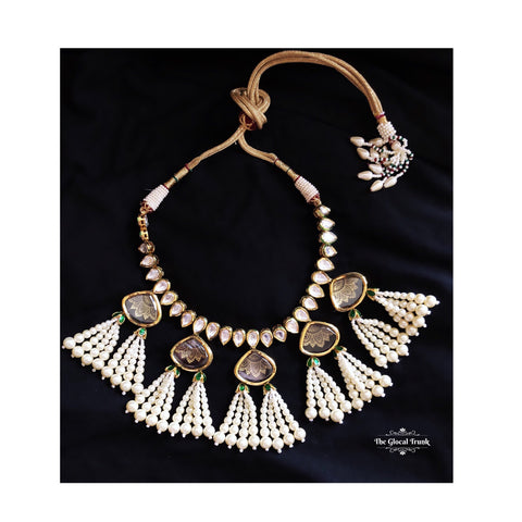 https://www.theglocaltrunk.com/products/jhoomar-kundan-and-pearl-tassel-necklace