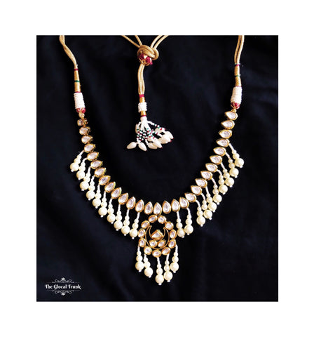 https://www.theglocaltrunk.com/products/sitara-kundan-and-pearl-dangler-choker-necklace
