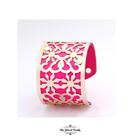 https://www.theglocaltrunk.com/products/lavish-cuff-mosaic-leather-metal-cuff-hot-pink