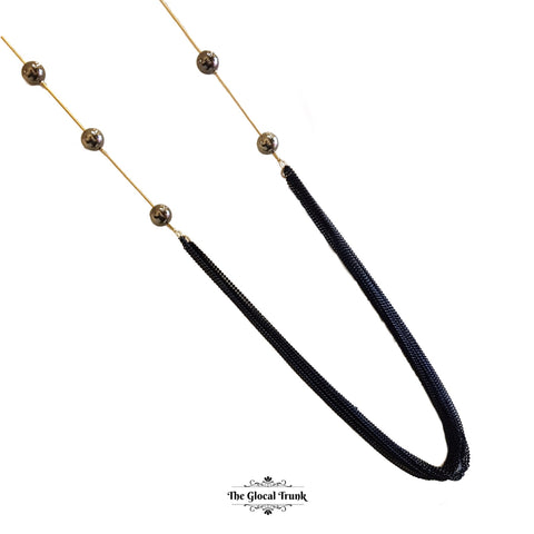 https://www.theglocaltrunk.com/products/onyx-pearl-and-black-multi-long-chain-necklace