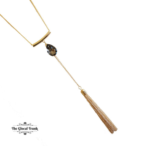 https://www.theglocaltrunk.com/products/droplet-long-tassel-necklace