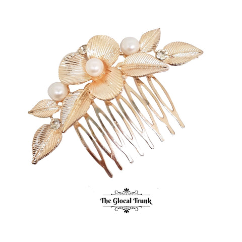 https://www.theglocaltrunk.com/products/alana-vintage-pearl-metal-comb