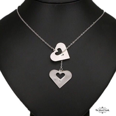 https://www.theglocaltrunk.com/products/our-hearts-necklace-silver