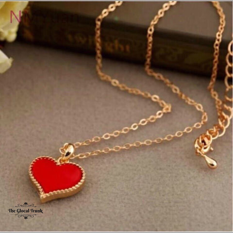 https://www.theglocaltrunk.com/products/petit-enamel-heart-pendant-necklace