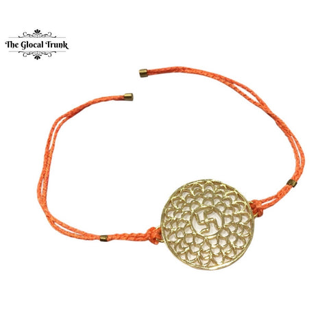 https://www.theglocaltrunk.com/collections/rakhi-collection/products/swastik-filigree-rakhi-orange-string