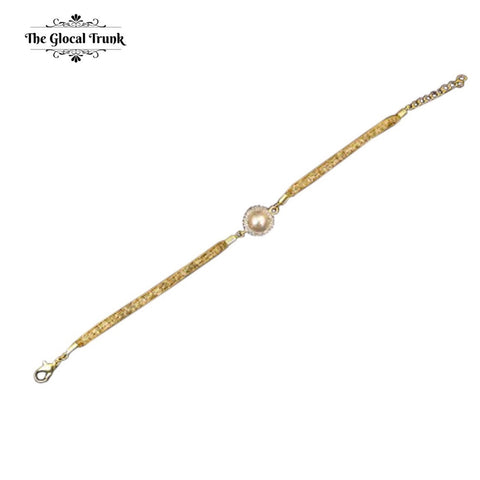 https://www.theglocaltrunk.com/collections/rakhi-collection/products/pearl-crystal-mesh-rakhi