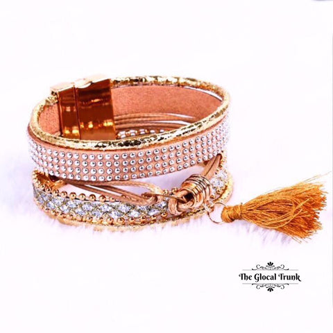 https://www.theglocaltrunk.com/products/clasp-me-leather-cuff-beige