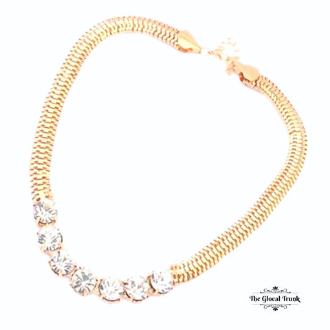 https://www.theglocaltrunk.com/products/estrela-choker-necklace-gold