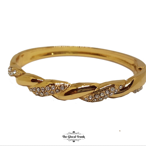 https://www.theglocaltrunk.com/products/braided-crystal-gold-slim-cuff