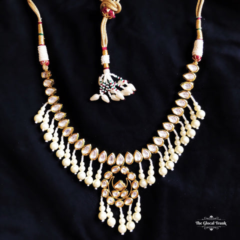 https://www.theglocaltrunk.com/products/sitara-kundan-and-pearl-dangler-choker-necklace