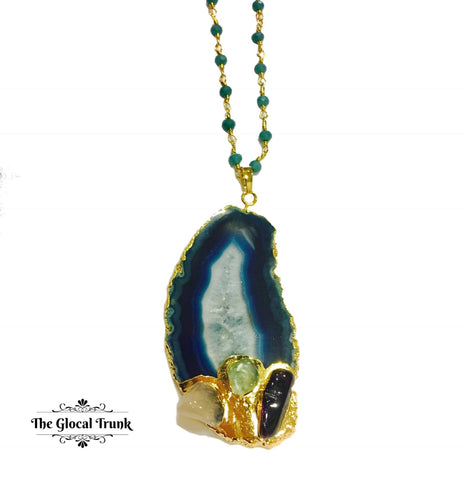 https://www.theglocaltrunk.com/products/agate-slice-necklace-blue-shaded