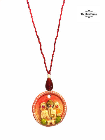 https://www.theglocaltrunk.com/collections/tgt-growth-buys-1/products/ganesha-engraved-pendant-necklace-red