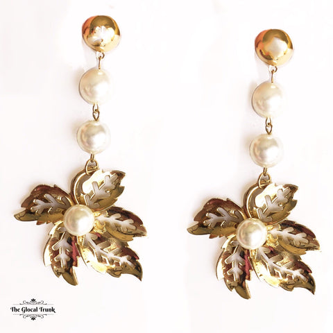 https://www.theglocaltrunk.com/products/palm-springs-pearl-metal-dangler-earrings