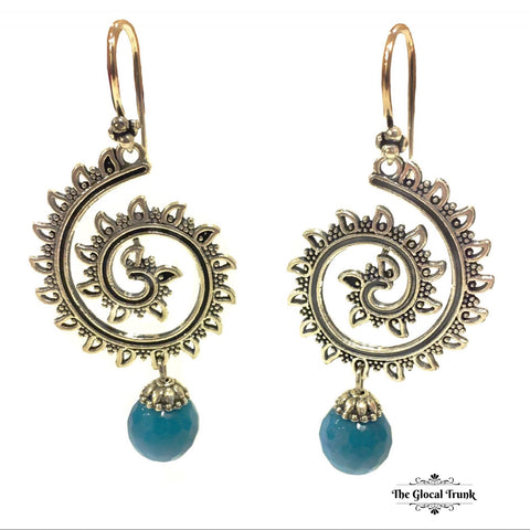 https://www.theglocaltrunk.com/products/twirl-drop-dangler-earrings-silver-blue