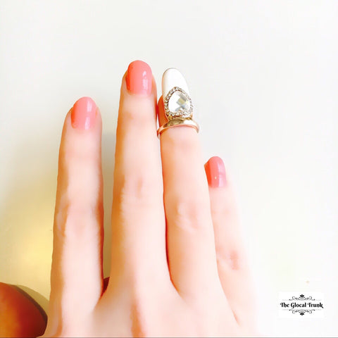 https://www.theglocaltrunk.com/products/heart-nail-ring-rose-gold