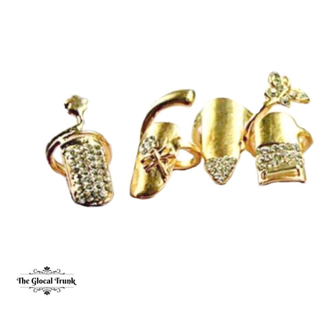 https://www.theglocaltrunk.com/products/duchess-set-of-4-nail-rings-gold