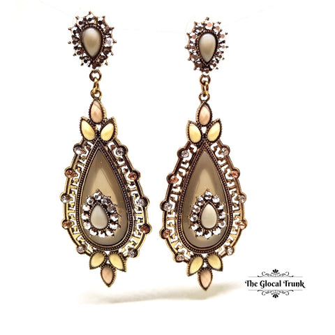 https://www.theglocaltrunk.com/products/adore-stone-and-crystal-vintage-earrings-khakhi