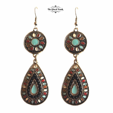 https://www.theglocaltrunk.com/products/tribal-tale-hook-dangler-earrings