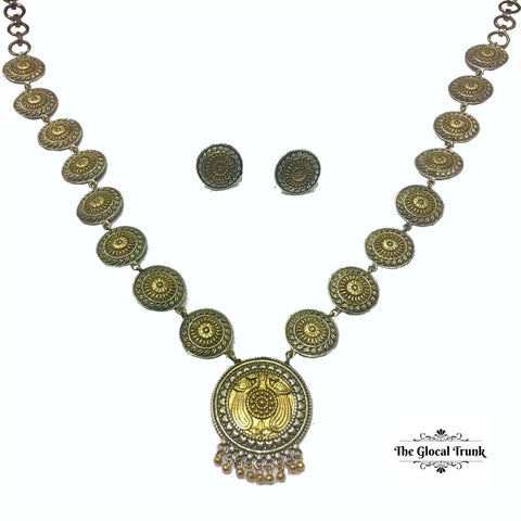 https://www.theglocaltrunk.com/products/two-tone-peacock-necklace-set