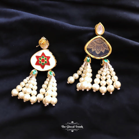 https://www.theglocaltrunk.com/products/jhoomar-kundan-and-pearl-tassel-earrings